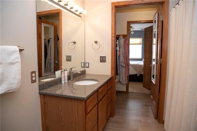 bathroom featuring vanity and hardwood / wood-style floors