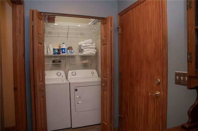 laundry area with washing machine and dryer