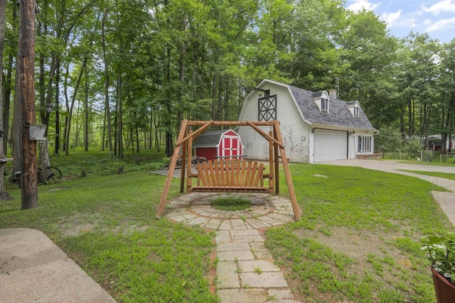 view of yard featuring a garage