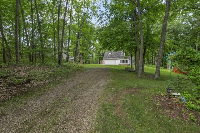 view of yard featuring a garage