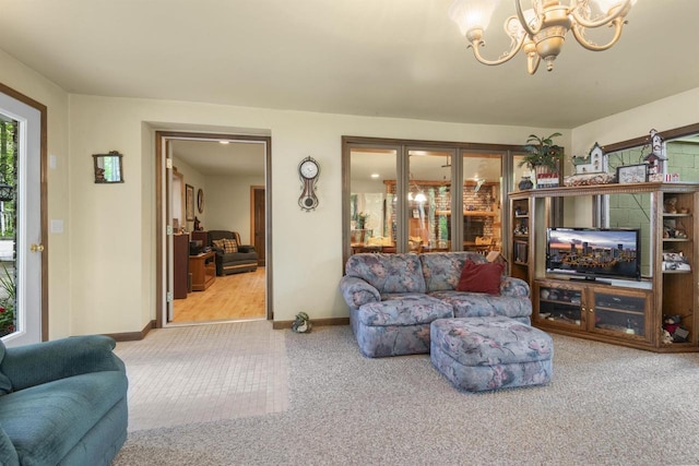 living room featuring light carpet and a notable chandelier