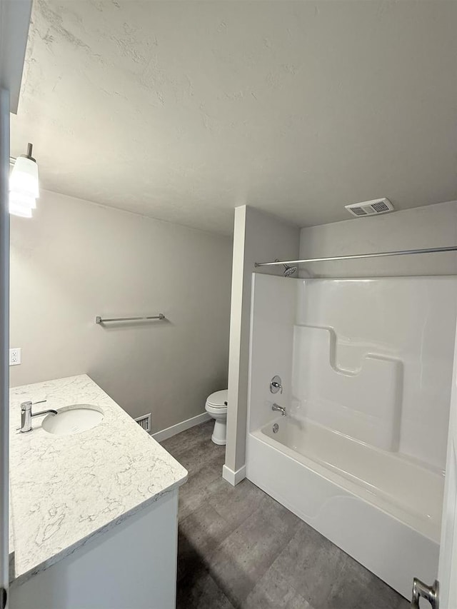 full bathroom featuring vanity, toilet, and shower / bath combination