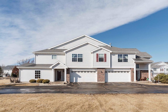 front of property with a garage