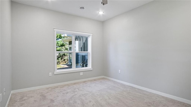 view of carpeted spare room