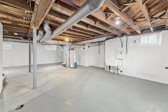 basement featuring water heater