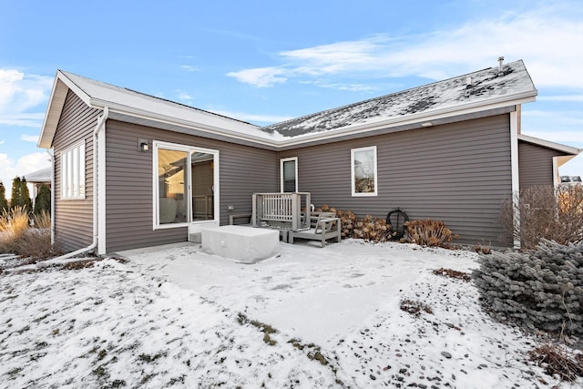 view of snow covered property