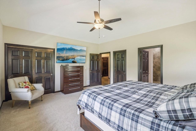 bedroom featuring ceiling fan and light colored carpet