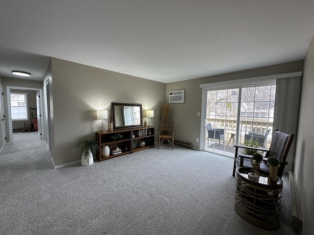 living area featuring a baseboard radiator, carpet flooring, and a wall unit AC