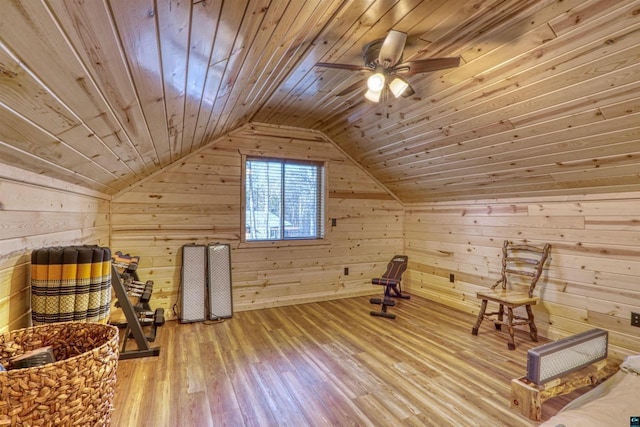 bonus room featuring hardwood / wood-style flooring, lofted ceiling, wood ceiling, and wood walls