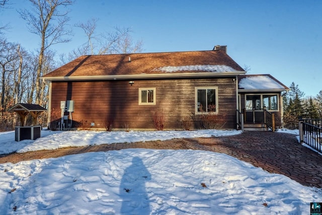 view of snow covered property