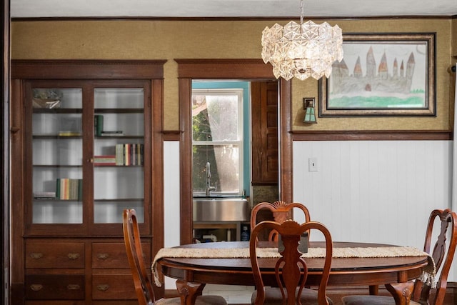 dining space featuring a chandelier