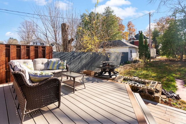 wooden deck with outdoor lounge area