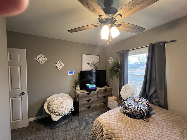 carpeted bedroom with ceiling fan