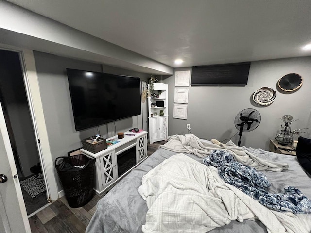 bedroom with hardwood / wood-style floors