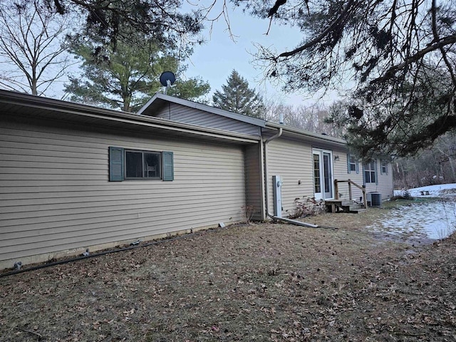 view of home's exterior featuring central AC