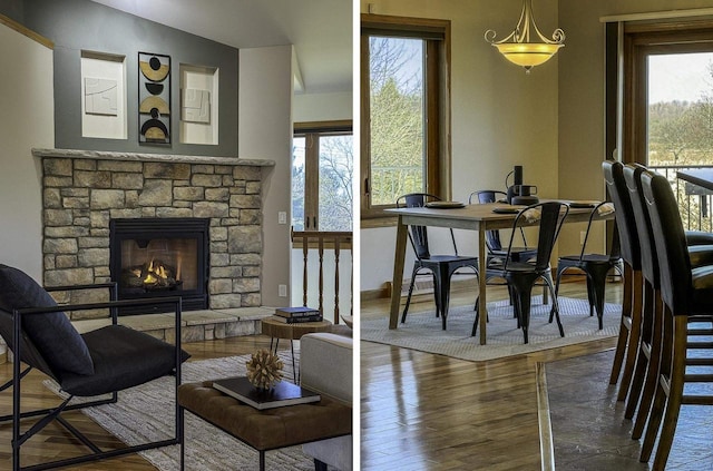 interior space featuring a stone fireplace and hardwood / wood-style floors