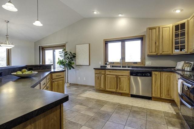 kitchen with hanging light fixtures, vaulted ceiling, sink, and appliances with stainless steel finishes