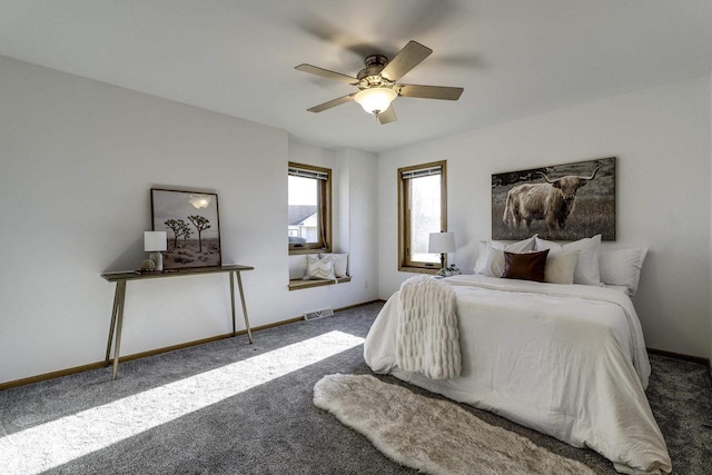 carpeted bedroom with ceiling fan