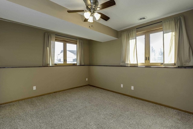 carpeted empty room with ceiling fan