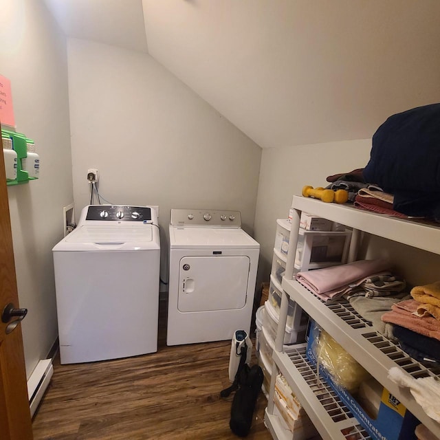 clothes washing area with separate washer and dryer, a baseboard radiator, and dark hardwood / wood-style floors