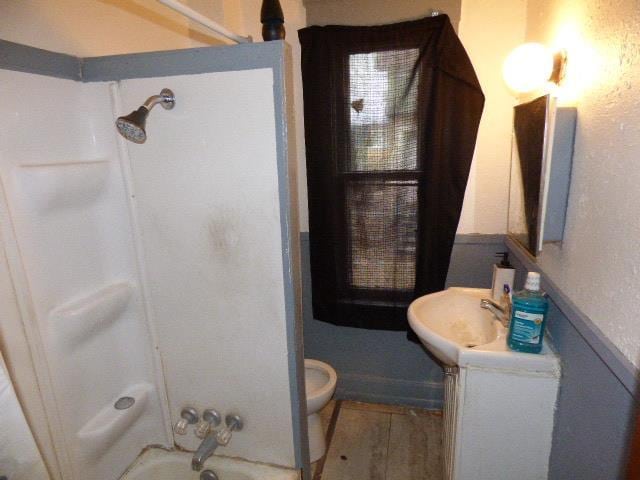 full bathroom featuring vanity, tub / shower combination, and toilet