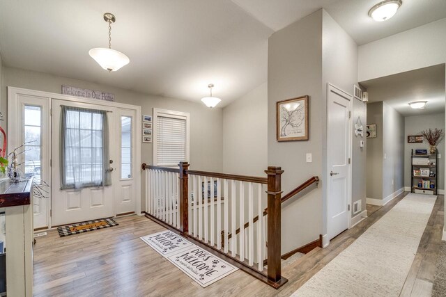 foyer with light hardwood / wood-style flooring