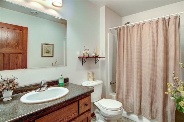 full bathroom with vanity, toilet, and shower / bath combo