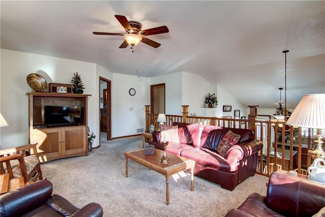 carpeted living room featuring lofted ceiling and ceiling fan