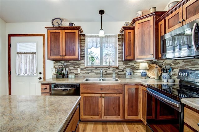 kitchen with sink, decorative light fixtures, black dishwasher, electric stove, and decorative backsplash