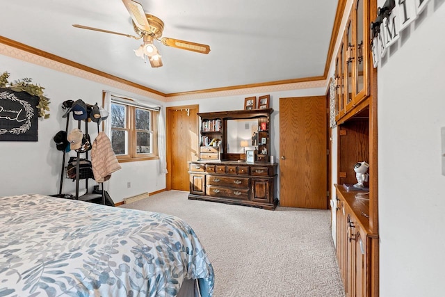 bedroom with crown molding, light colored carpet, and ceiling fan