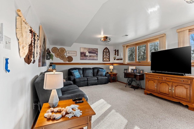 living room featuring light carpet