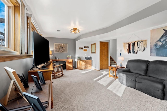 living room with light colored carpet