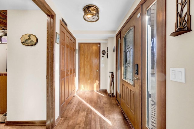 hall featuring hardwood / wood-style floors