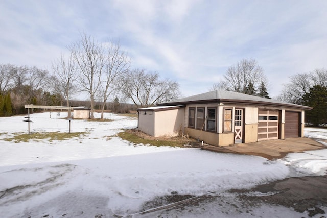 exterior space featuring a garage