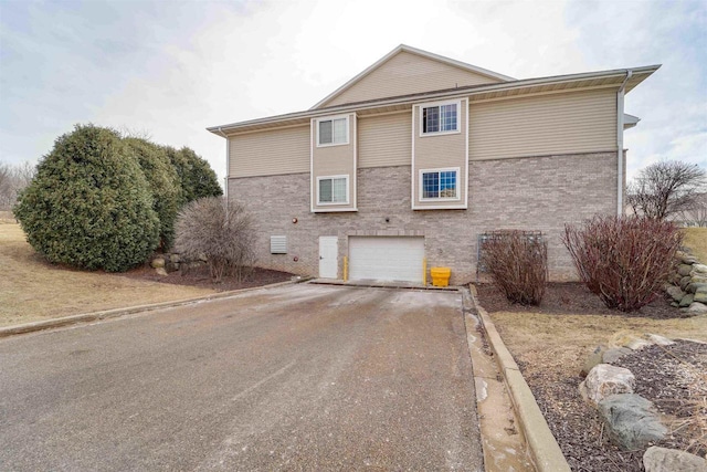 view of home's exterior with a garage