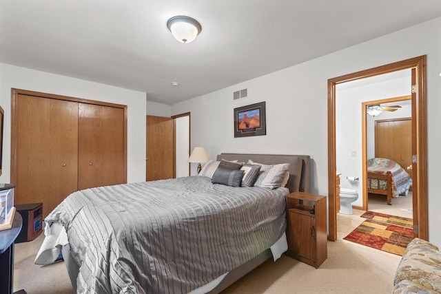 carpeted bedroom featuring a closet