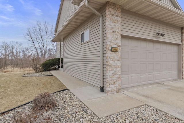 view of property exterior featuring a garage