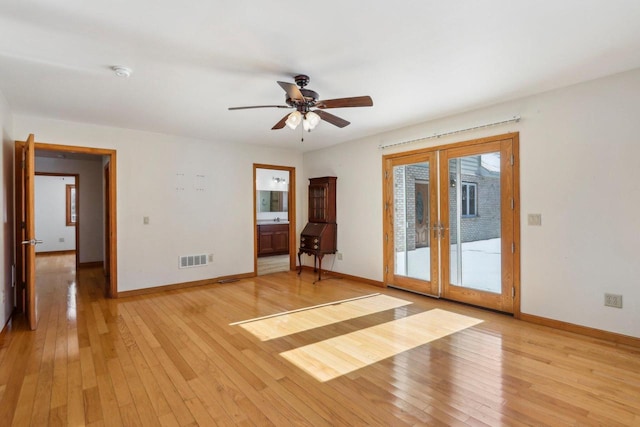8209 N Port Washington Rd, Fox Point, WI 53217 - empty room with french doors, visible vents, light wood-style flooring, ceiling fan, and baseboards