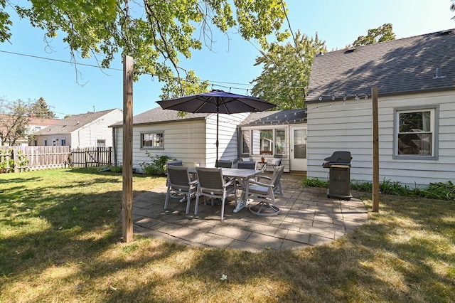 view of patio with a grill