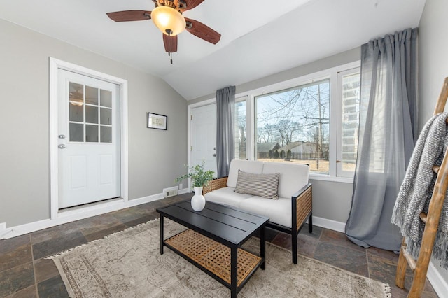 sitting room with lofted ceiling and ceiling fan