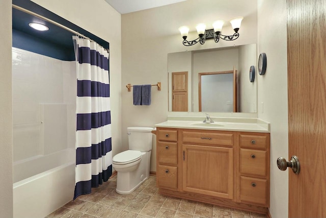 full bathroom featuring shower / tub combo with curtain, vanity, and toilet