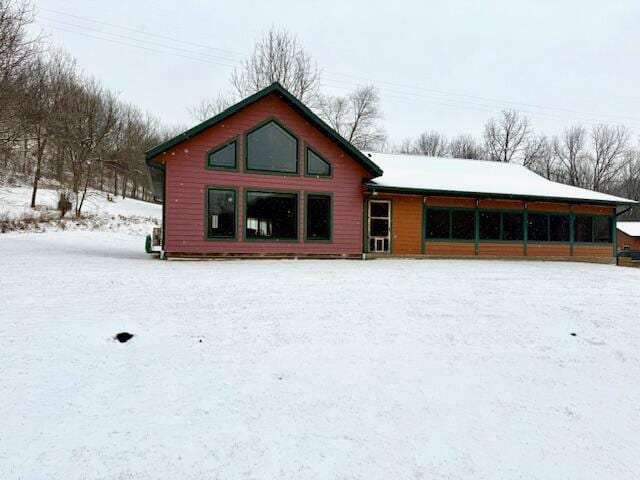 view of snow covered house