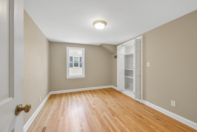 spare room featuring light wood-type flooring