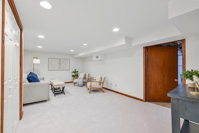 living room with light colored carpet