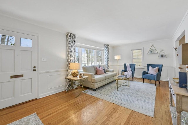 living room with light hardwood / wood-style flooring