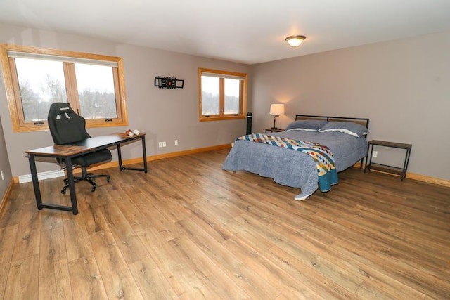 bedroom featuring light wood-type flooring