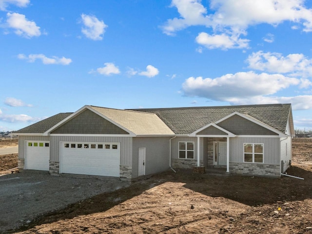 ranch-style home with a garage