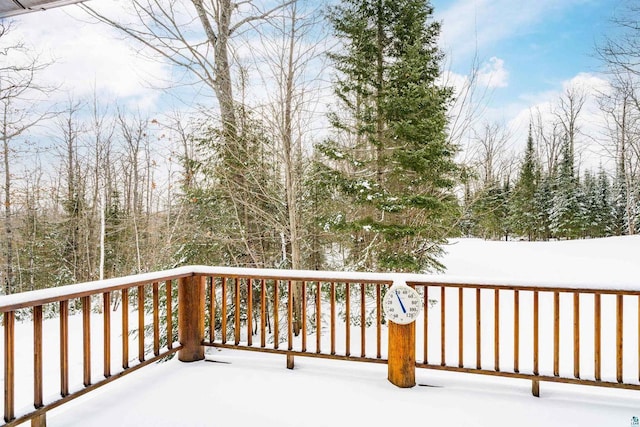 view of snow covered deck