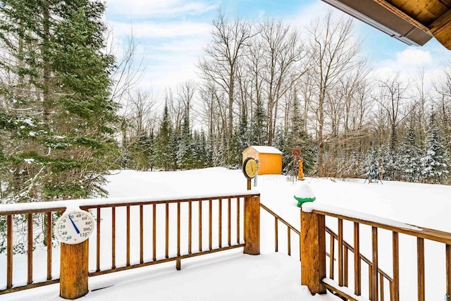 view of snow covered deck