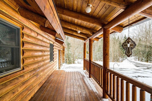 view of snow covered deck